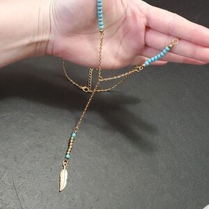 Gold tone feather turquoise necklace 26-28" Y style bead